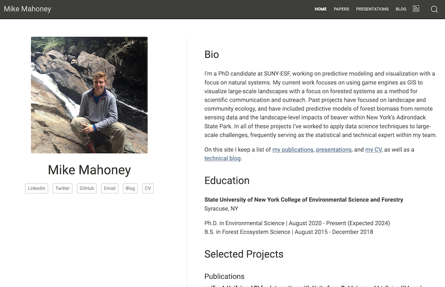 Personal site with a photo of a man seated on rocks beside a bio and education